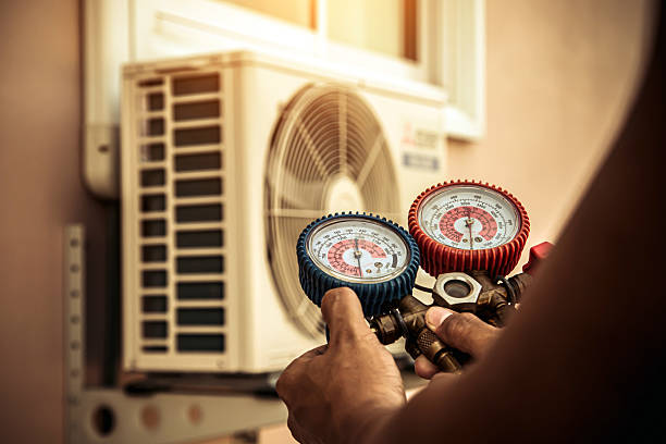 Professional Air Conditioning Service technician working in Haworth, NJ